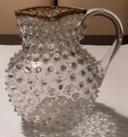 Bütyköskancsó, 1900 körül, színtelen üveg.  Zemplén.  M: 12 cm.