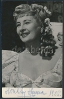 Honthy Hanna (1893-1978) Kossuth-díjas színművésznő, operettprimadonna, érdemes és kiváló művész aláírása egy a művésznőt ábrázoló fotón, apró hibával, 8x5cm