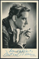 Dieter Borsche (1909-1982)német színész  saját kezű aláírása egy őt ábrázoló fotólapon, 14x9cm/ Signature of  Dieter Borsche (1909-1982) German actor