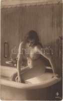 Erotic nude lady bathing. photo (pinholes)