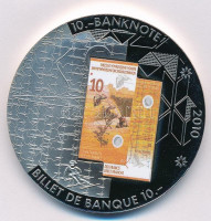 Svájc 2010. '10.-banknote' fém emlékérem 10Fr svájci bankjegy multicolor képével (50mm) T:1 Switzerland 2010. '10.-banknote' metal commemorative medallion with the multicolor image of 10 Francs banknote (50mm) C:UNC