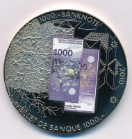 Svájc 2010. '1000.-banknote' fém emlékérem 1000Fr svájci bankjegy multicolor képével (50mm) T:1 Switzerland 2010. '1000.-banknote' metal commemorative medallion with the multicolor image of 1000 Francs banknote (50mm) C:UNC